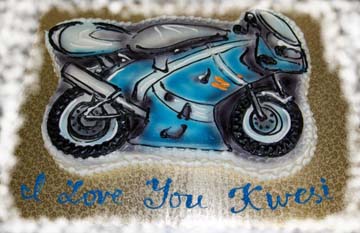 motor cycle cake, baby shower cake, pool ball cake, foot cake, sneaker